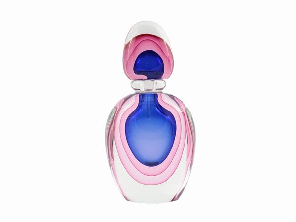 Perfume bottle in transparent, pink and blue submerged glass
