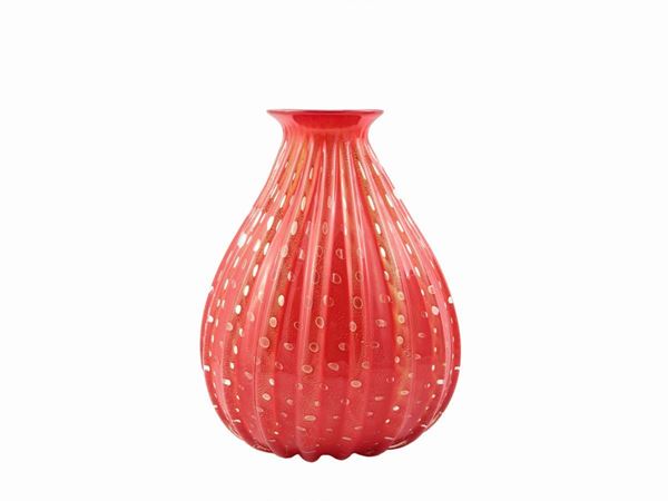 Ribbed vase in bright orange cased glass