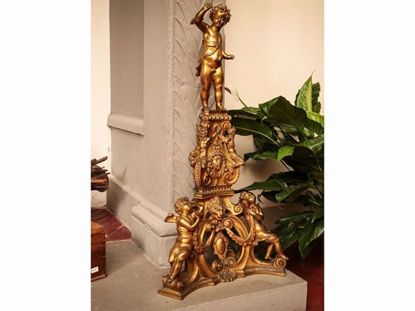 Coppia di frontoni per alari in bronzo dorato