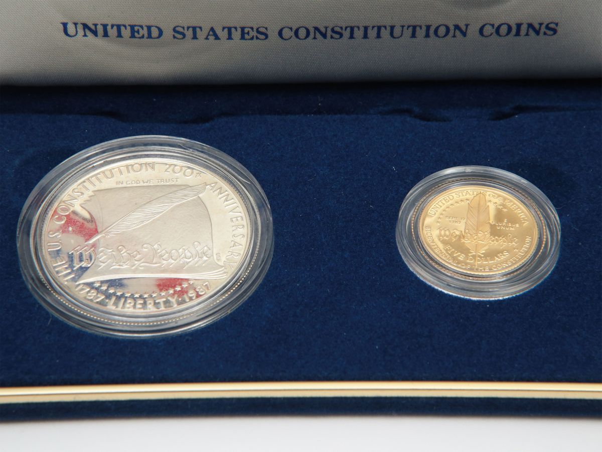 Una Serie da 1 e 5 Dollari in Argento e Oro