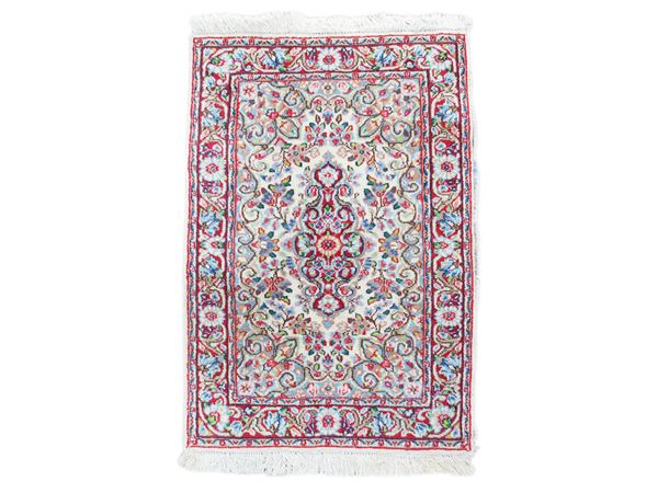 Coppia di piccoli tappeti persiani