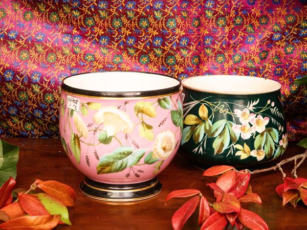 Two porcelain vase holders