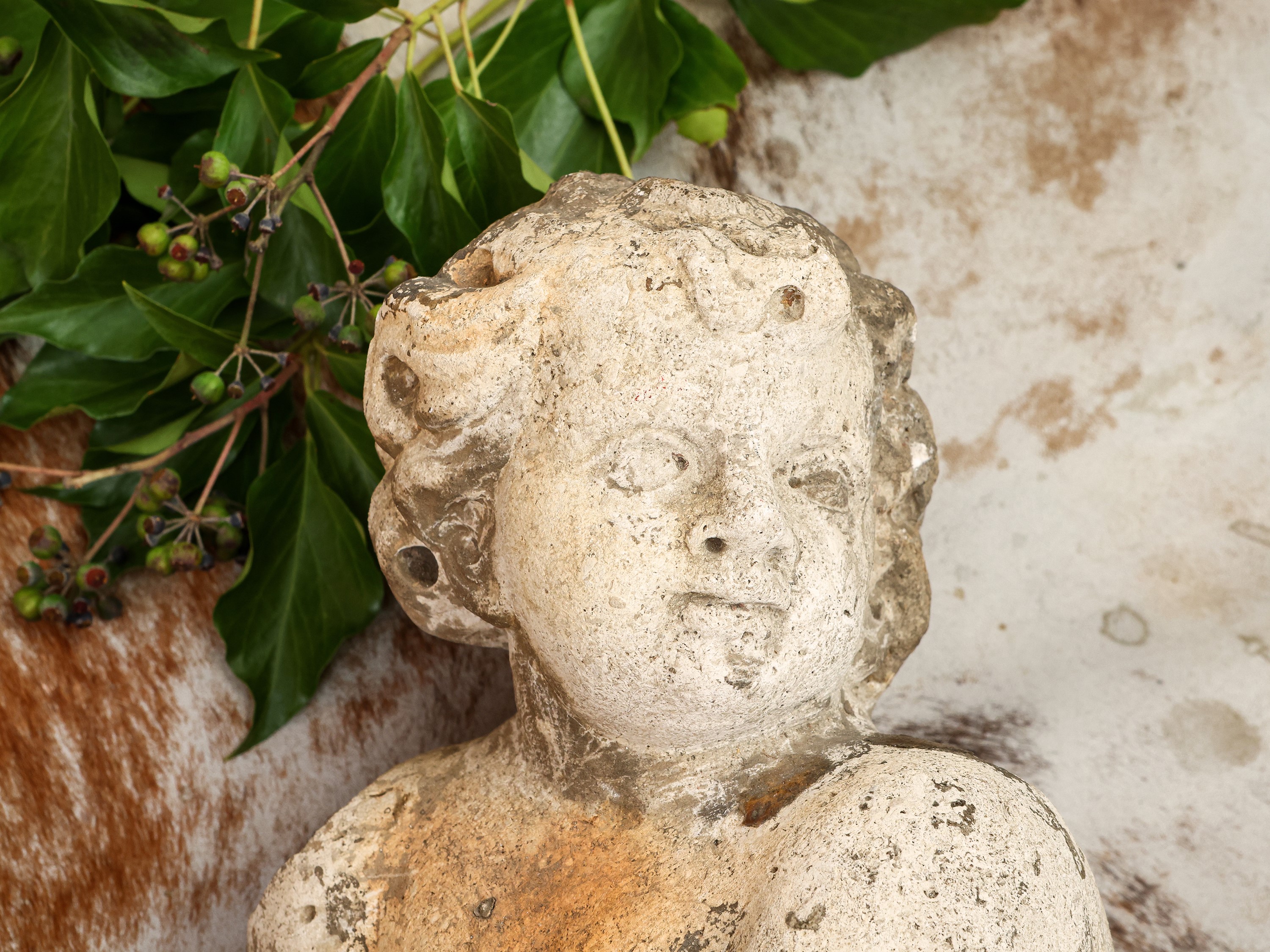 Coppia di Putti in Pietra