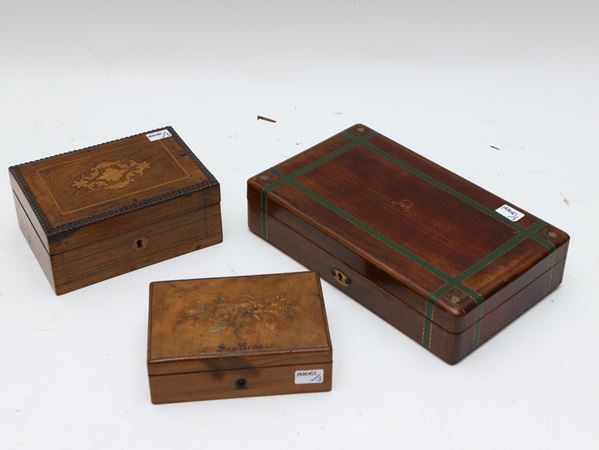 Tre scatole in legno intarsiato