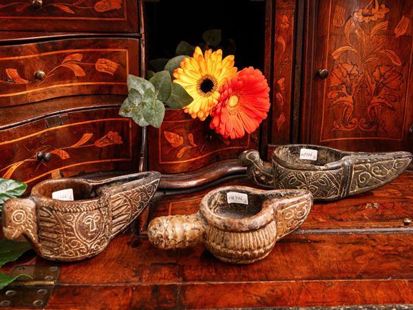 Three ancient zoomorphic soapstone lamps