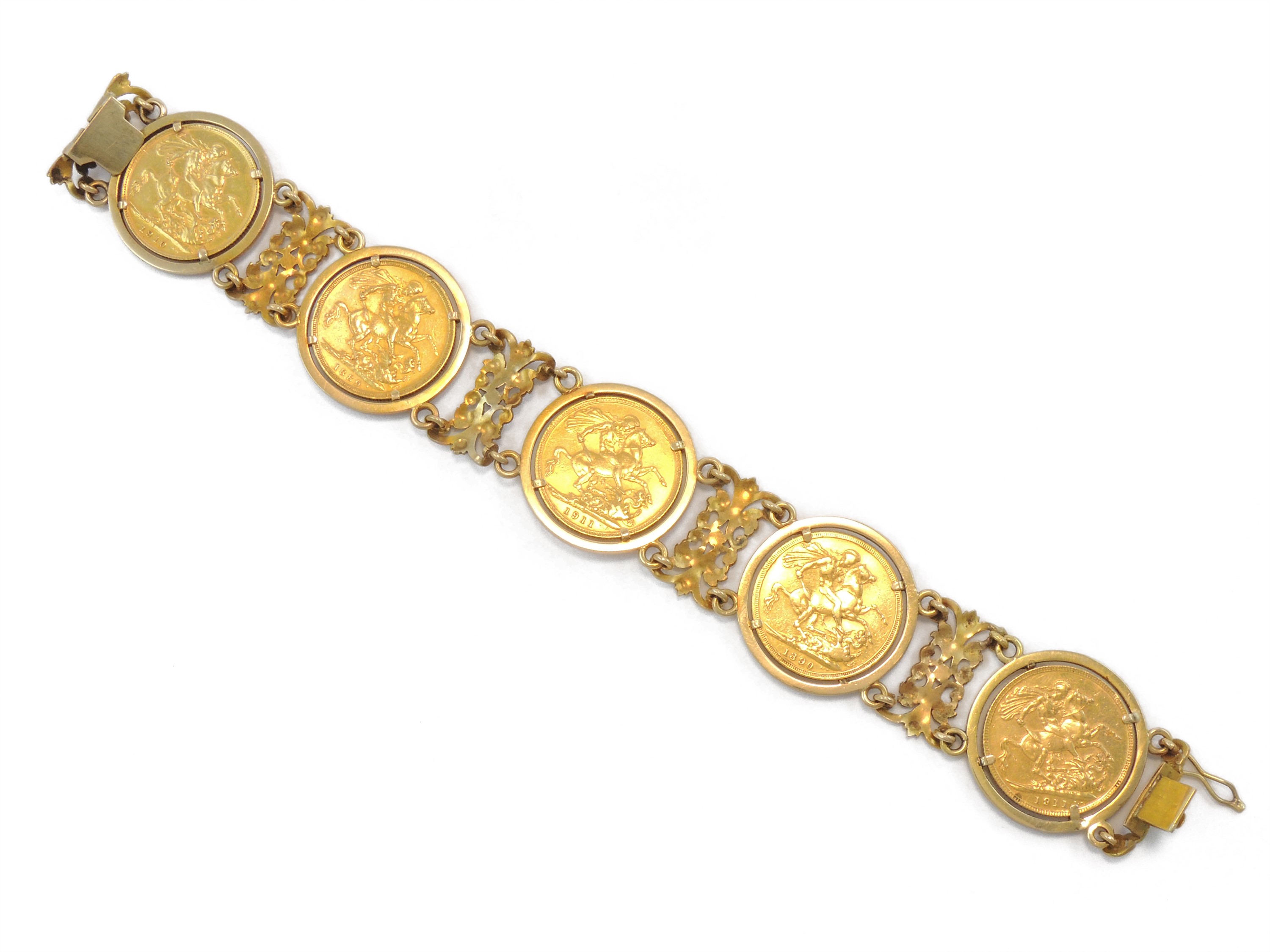 Bracciale in Oro Giallo con Cinque Monete da una Sterlina