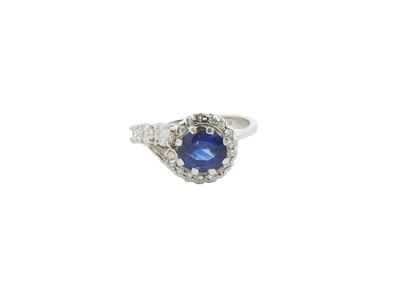Anello in Oro Bianco con Diamanti e Zaffiro