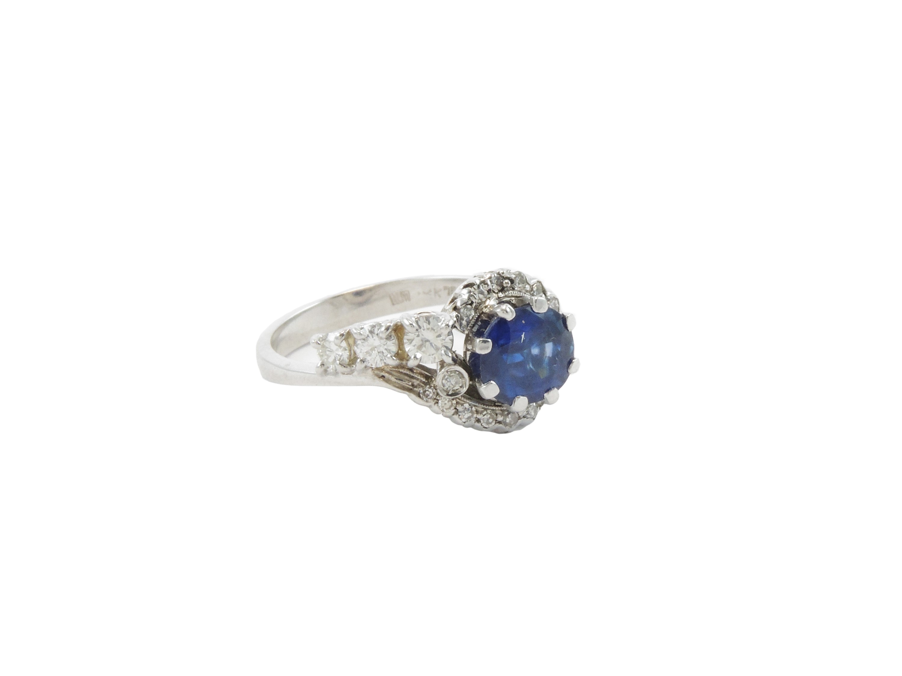 Anello in Oro Bianco con Diamanti e Zaffiro