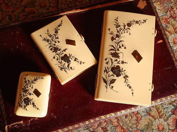 Set for girls in ivory inlaid probably in yellow gold and silver