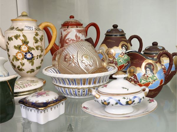 Assortment of porcelain teapots and milk jugs