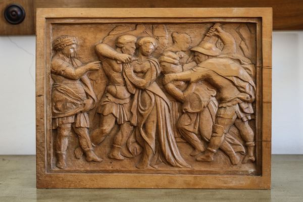 Bas-relief carved wooden plaque