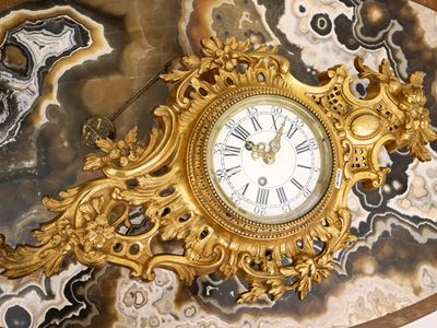 Orologio Cartel in Bronzo Dorato