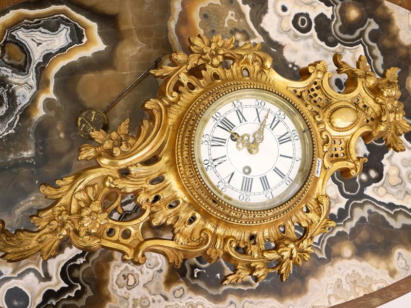 Orologio Cartel in Bronzo Dorato