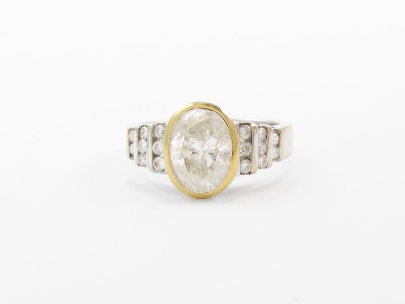 Anello in Oro Bianco e Giallo con Diamanti