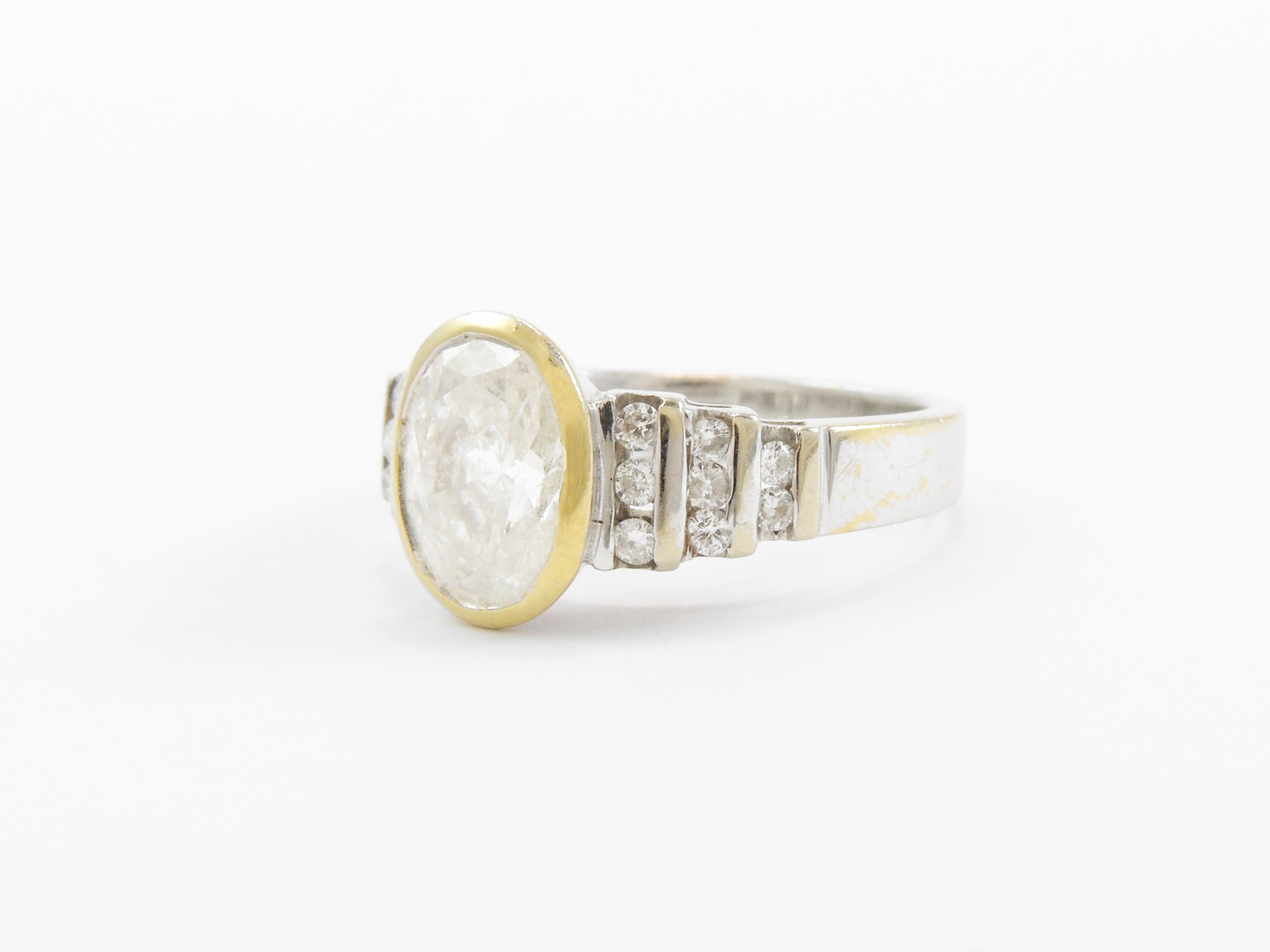 Anello in Oro Bianco e Giallo con Diamanti