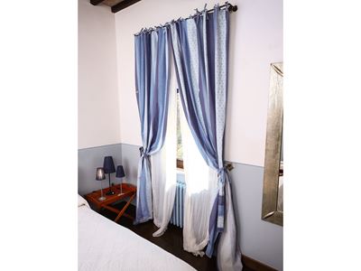 Tendaggio per Due Finestre