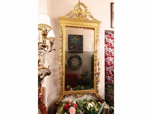 Mirror with carved and gilded wooden frame