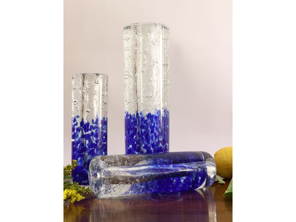 Serie di tre vasi in vetro soffiato pesante