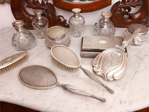 Assortment of silver toilet accessories