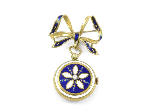 Yellow gold watch brooch with diamond and blue and white enamels