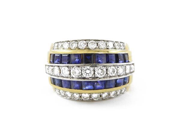 White and yellow gold band ring yellow gold with diamonds and sapphires