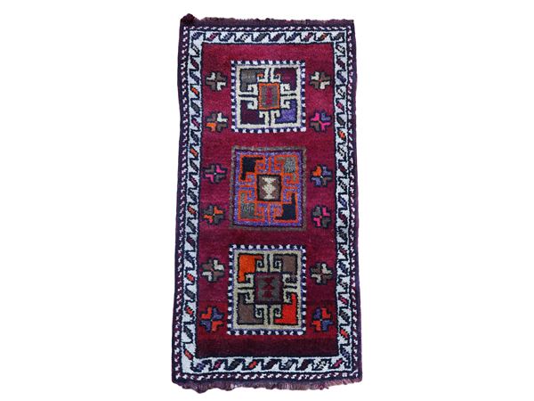 Two small Caucasian rugs