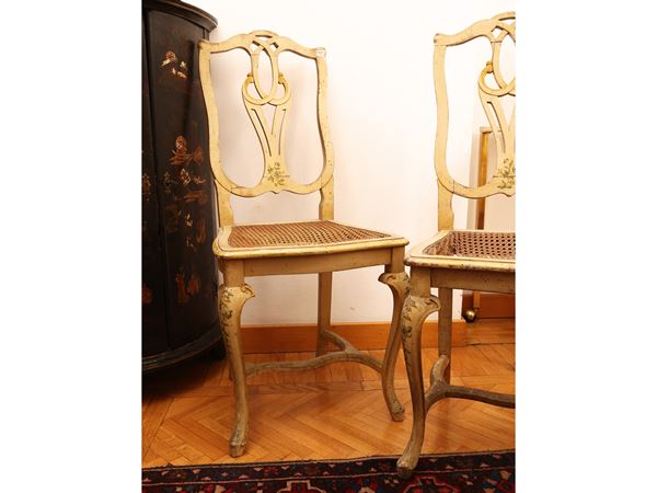 Pair of chairs in lacquered wood