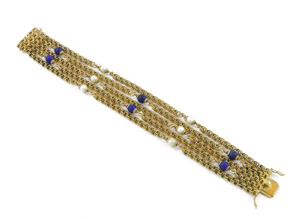 Yellow gold Micheletto bracelet with cultured pearls and lapis lazuli