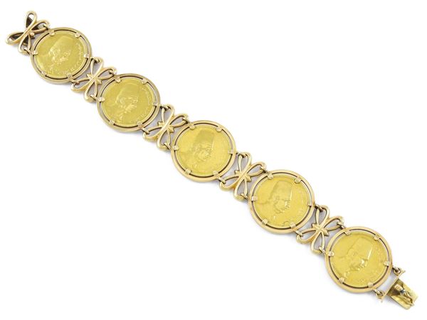 Yellow gold bracelet with five 100 Egyptian piastre coins