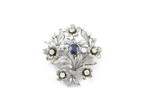 White gold floreal brooch with diamonds and sapphire