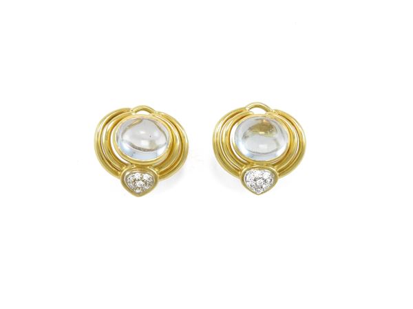 Yellow gold earrings with diamonds and aquamarines