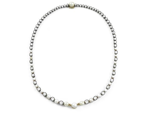 Yellow gold and silver necklace with diamonds and pearls