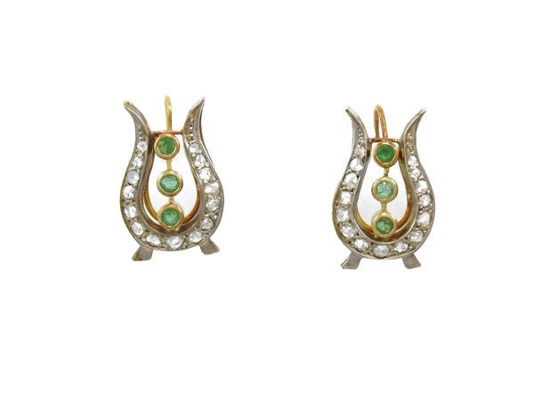 Yellow gold and silver earrings with diamonds and emeralds