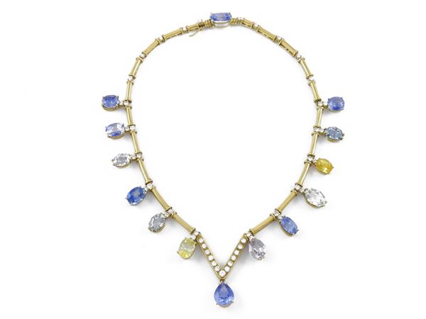 Yellow gold necklace with diamonds, sapphires and multicolored corundums