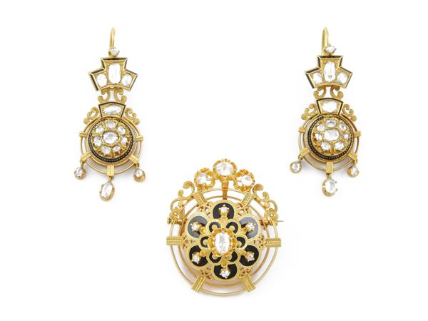 Yellow gold demi parure pendant brooch and earrings with diamonds and black enamel