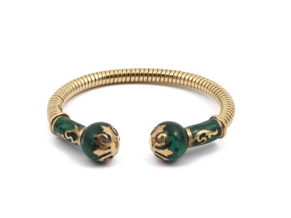 Yellow gold bangle Fidia with green enamels
