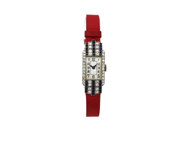 White gold lady jewel wristwatch with diamonds and syntethic sapphires