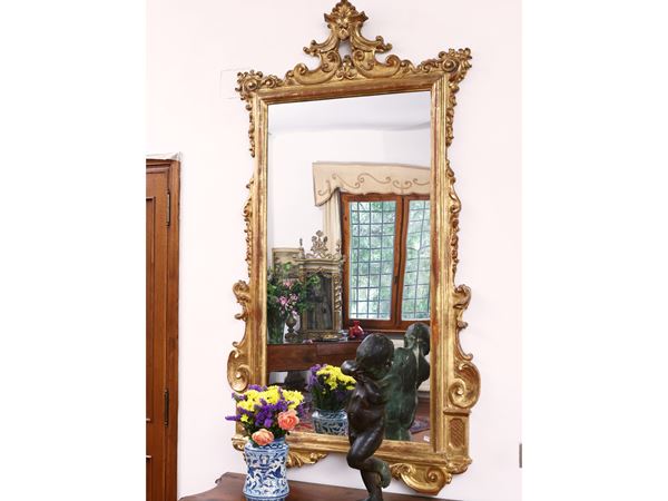 Mirror with carved and gilded wooden frame