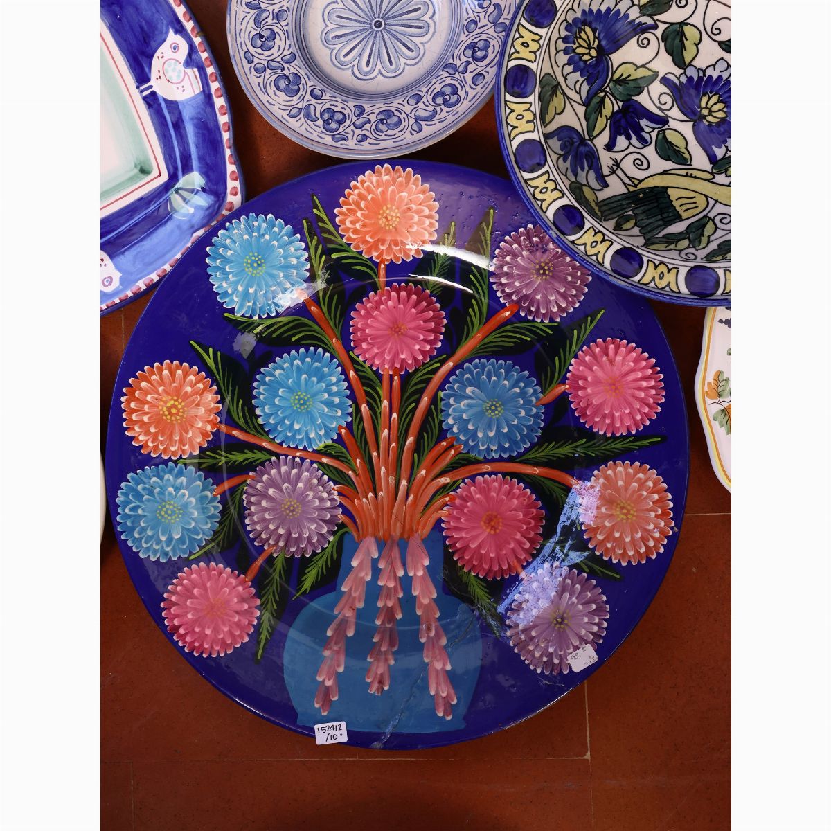 Dieci Piatti Decorativi in Terraglia e Ceramica