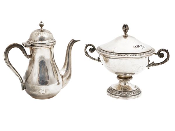 Two silver table accessories