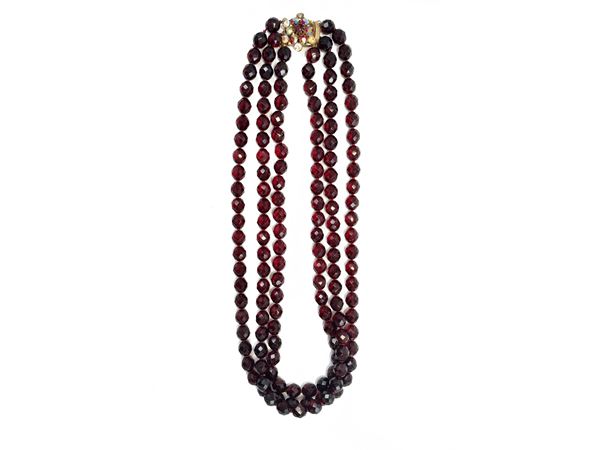Garnet colored three-strand necklace