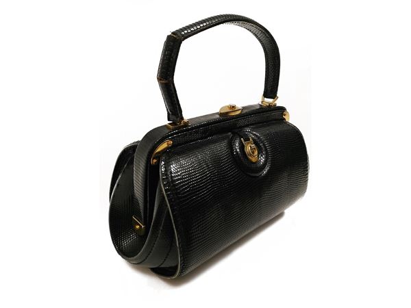 Handbag in black lizard
