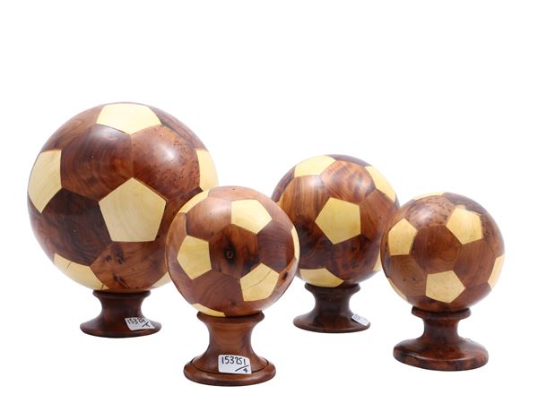 Series of four decorative spheres in various essences