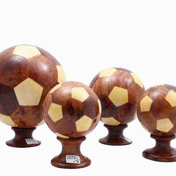 Series of four decorative spheres in various essences