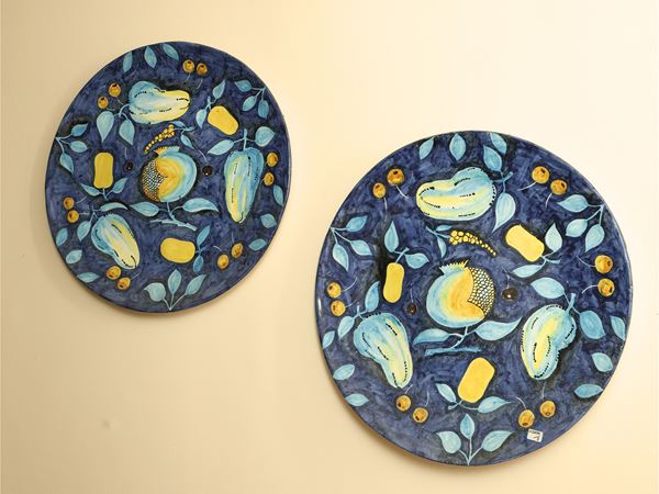 Pair of glazed terracotta parade plates
