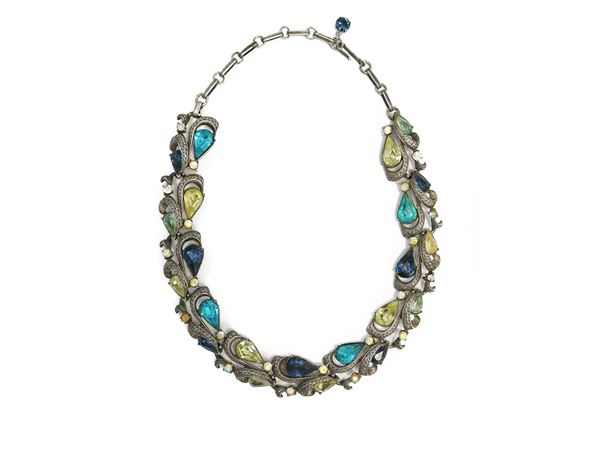 Necklace in metal and colored crystals