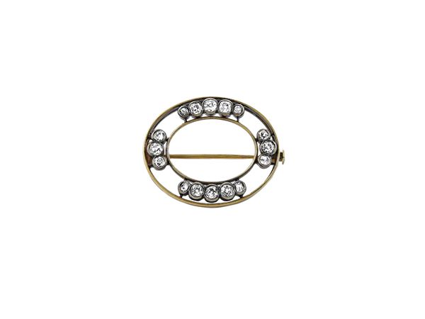 Spilla in oro giallo e argento con diamanti  (Inizio del XX secolo)  - Asta Gioielli e Orologi - Maison Bibelot - Casa d'Aste Firenze - Milano