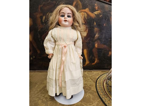 Doll with biscuit head and shoulders