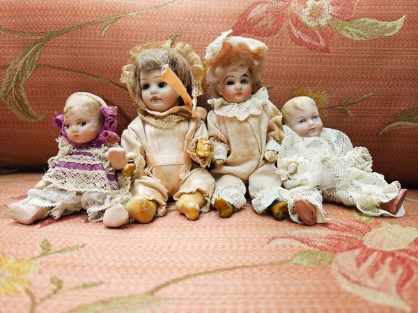 Four baby dolls