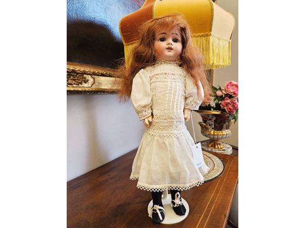 Doll with biscuit head
